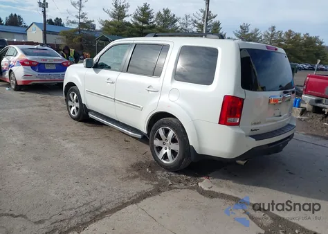 2014 Honda Pilot Touring z USA, uszkodzony, nr VIN 5FNYF4H94EB011149